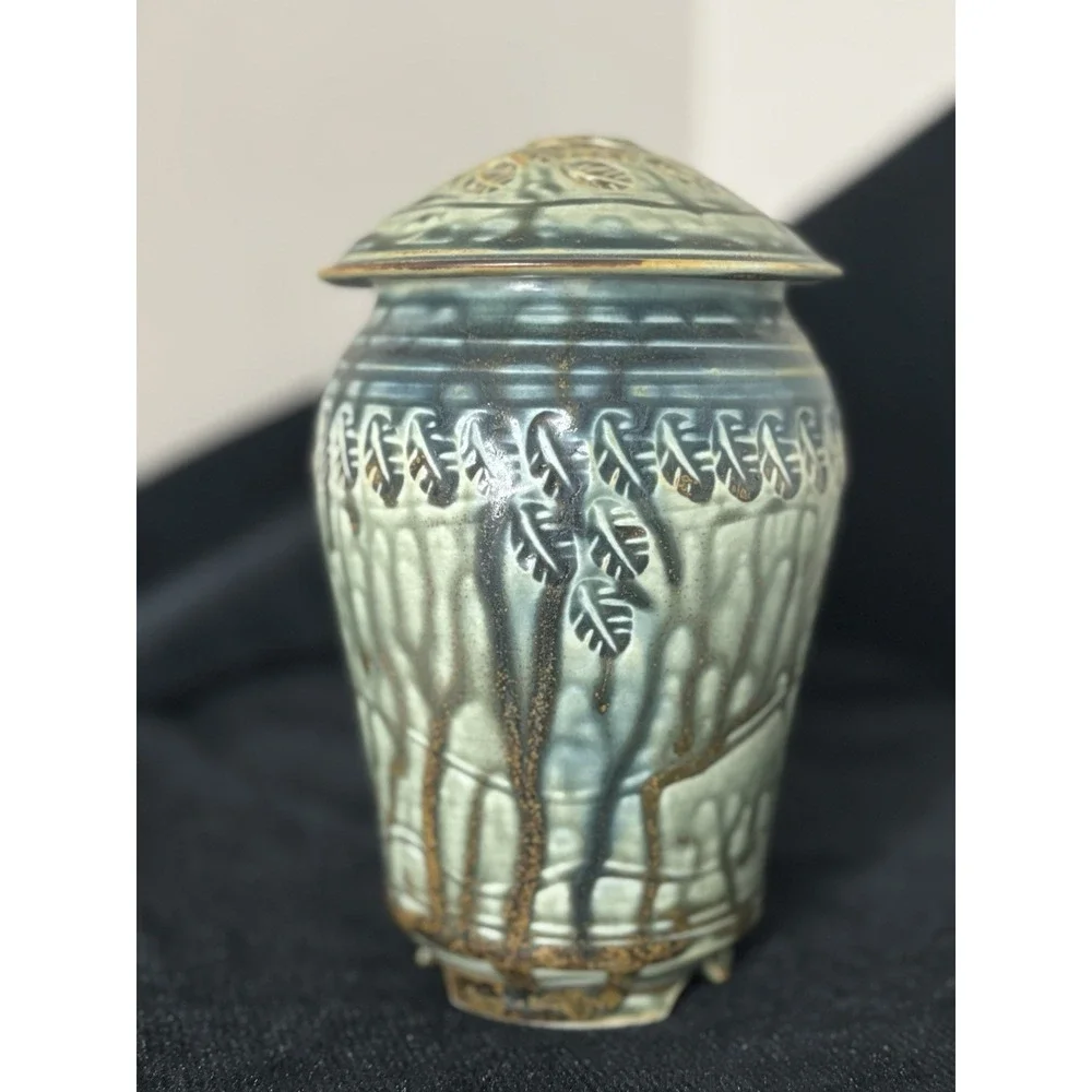North Carolina Pottery With A Lid. Blue And Sage With A Leaf Motif
